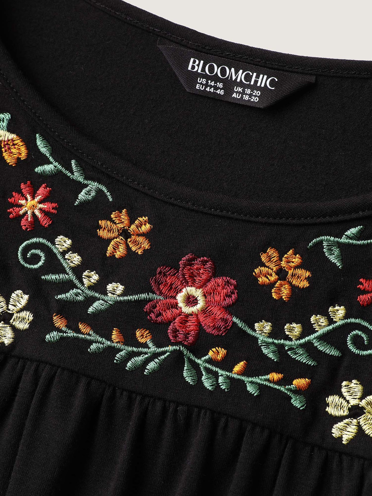 Stretchy Floral Embroidery Ruffled Hem Top