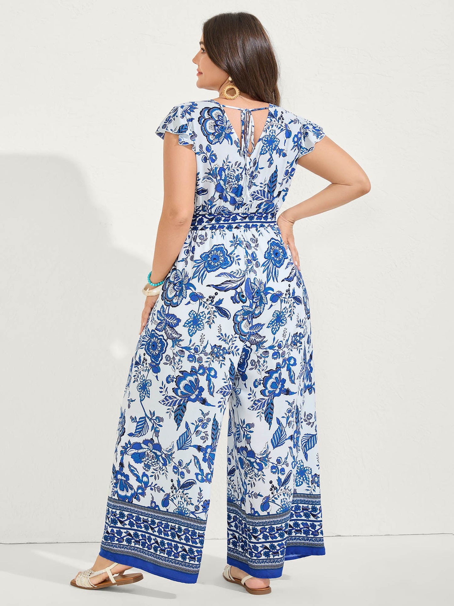 Boho Print Surplice Neck Belted Jumpsuit