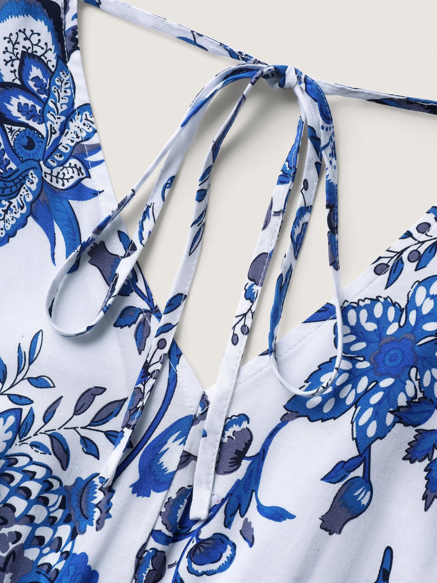 Boho Print Surplice Neck Belted Jumpsuit
