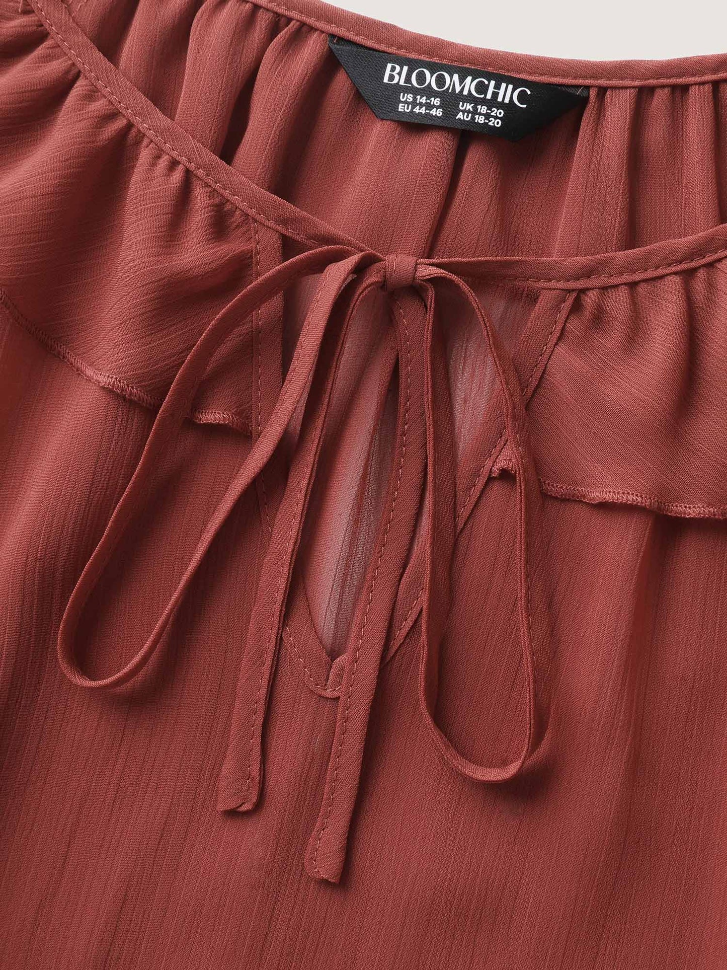 Sheer Ruffled Neck Flowy Solid Blouse