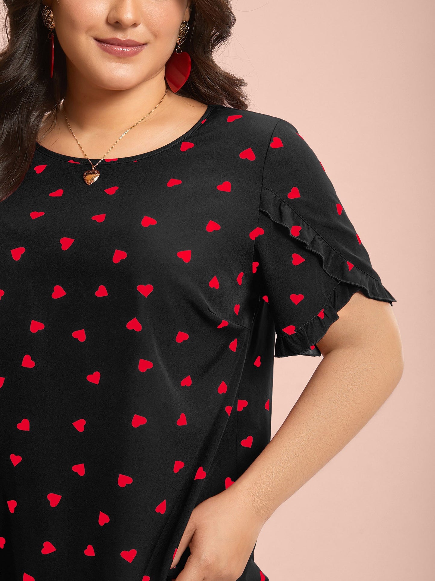 Ruffled Overlap Sleeve Heart Pattern Blouse